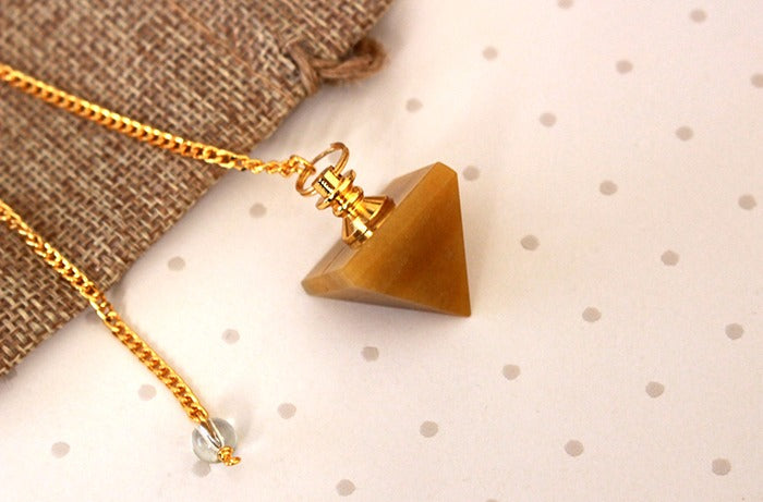 pendule pyramide calcite jaune